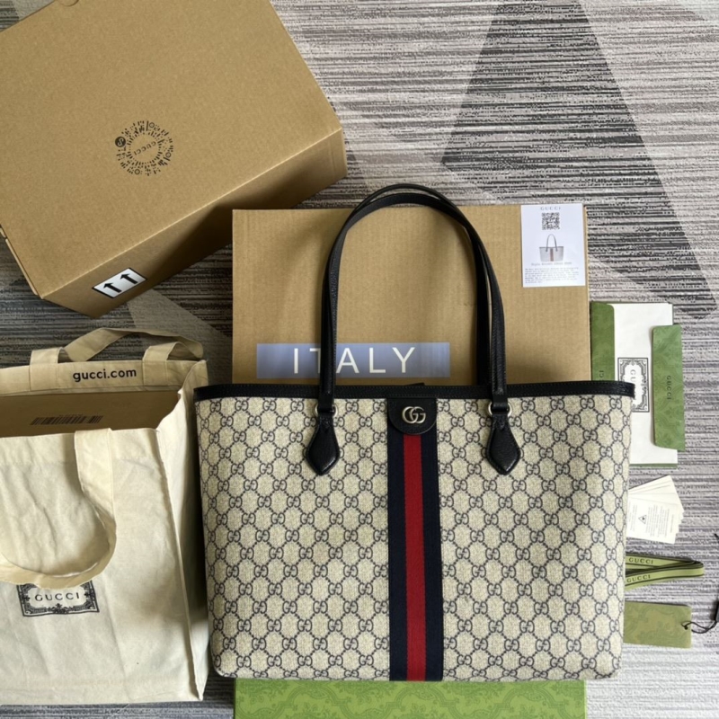 G*u*i shopping bags